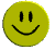 gif of a flat yellow circle with a smiley face on it spinning from left to right